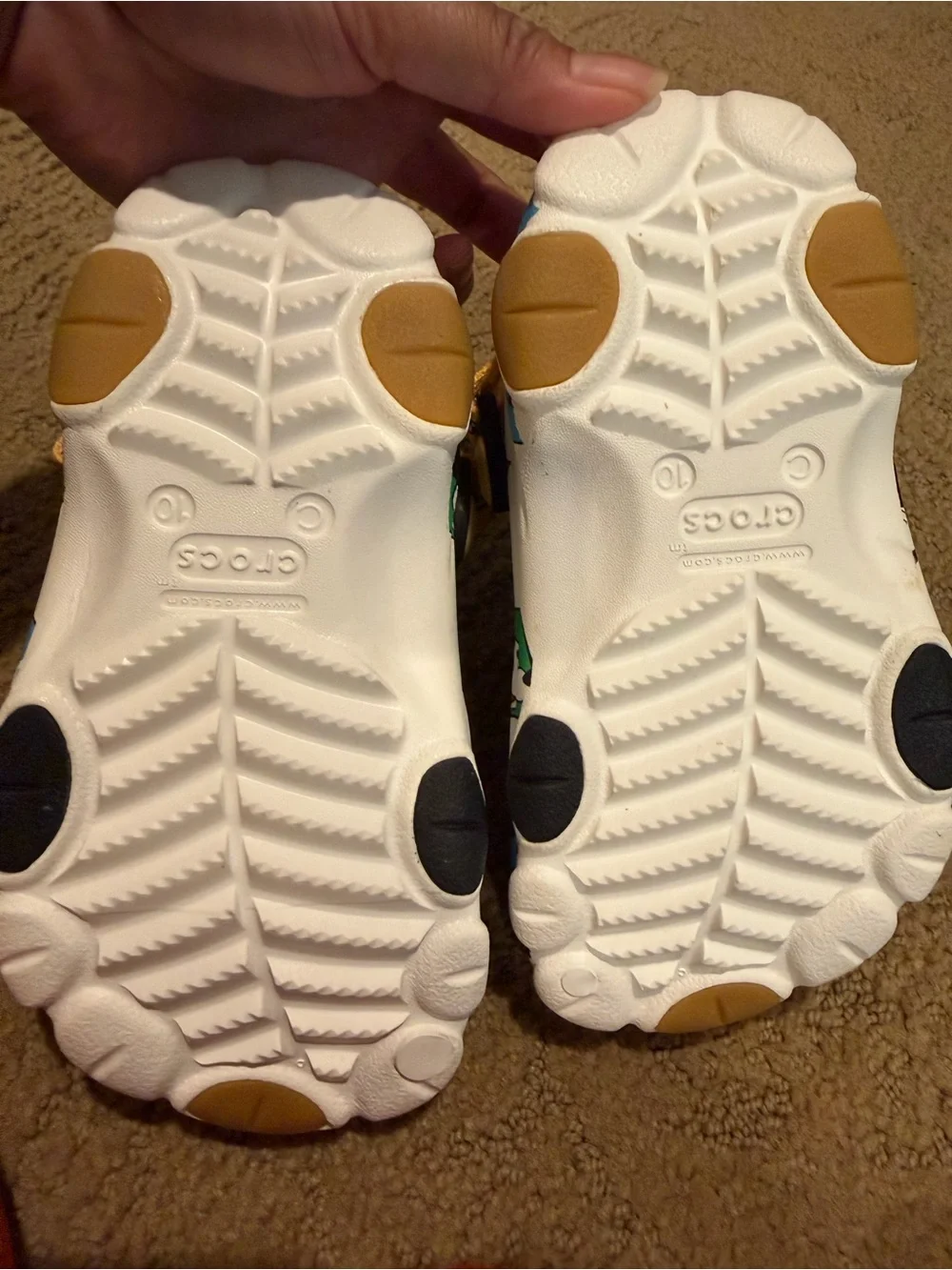 CROCS Kids' White Mickey Mouse Graphic Clogs with Blue and Yellow Accents